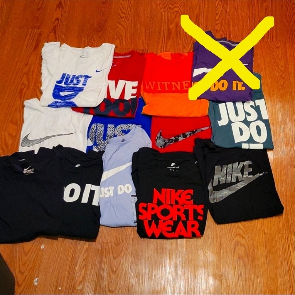 Nike Tshirt Bundle. Total of 12 shirts, purple one sold separately. Sorry
